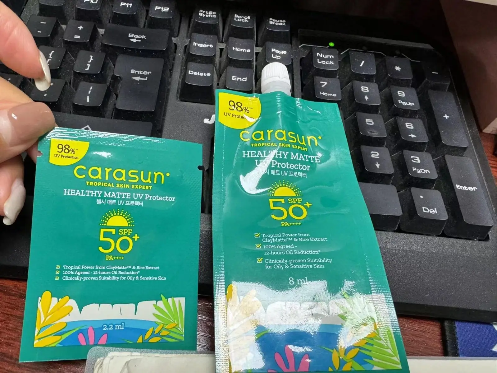 Printed custom sauce packet with dispensing spout and branded packaging